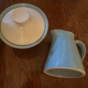 1960s blue and white sugar bowl and blue creamer set. USA pottery, vintage.